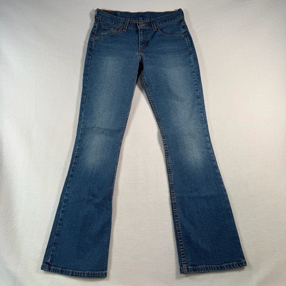 Levis Jeans Womens 4 Blue Bootcut Relaxed Mid Rise Medium Wash - Picture 1 of 13
